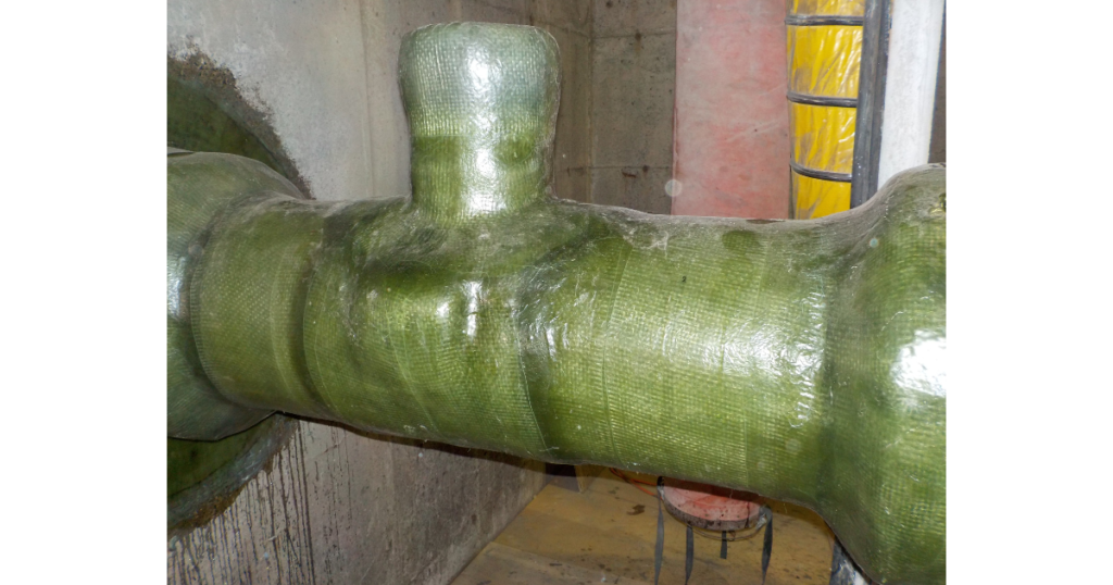 FRP wrap repair on a wastewater piping system